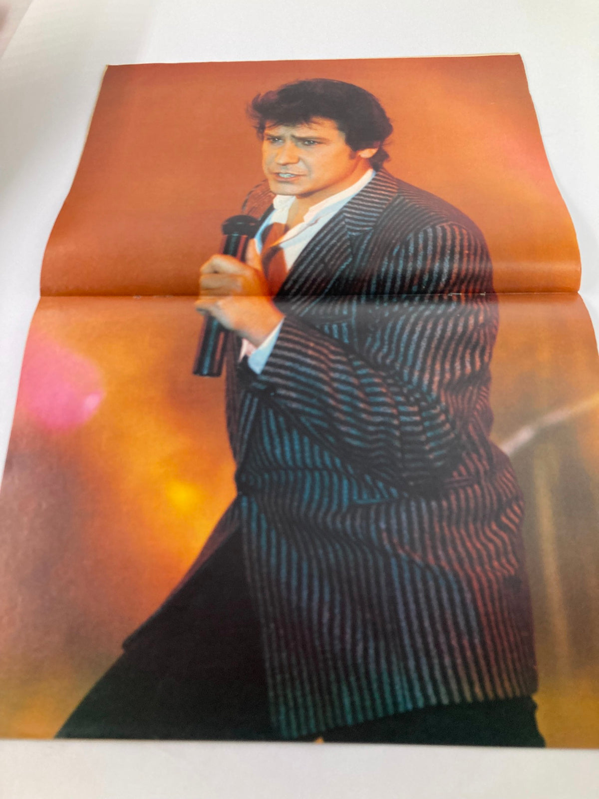 VTG Lookin Magazine March 8 1986 #11 featuring a performer with a microphone, showcasing vibrant stage presence and fashion of the era.