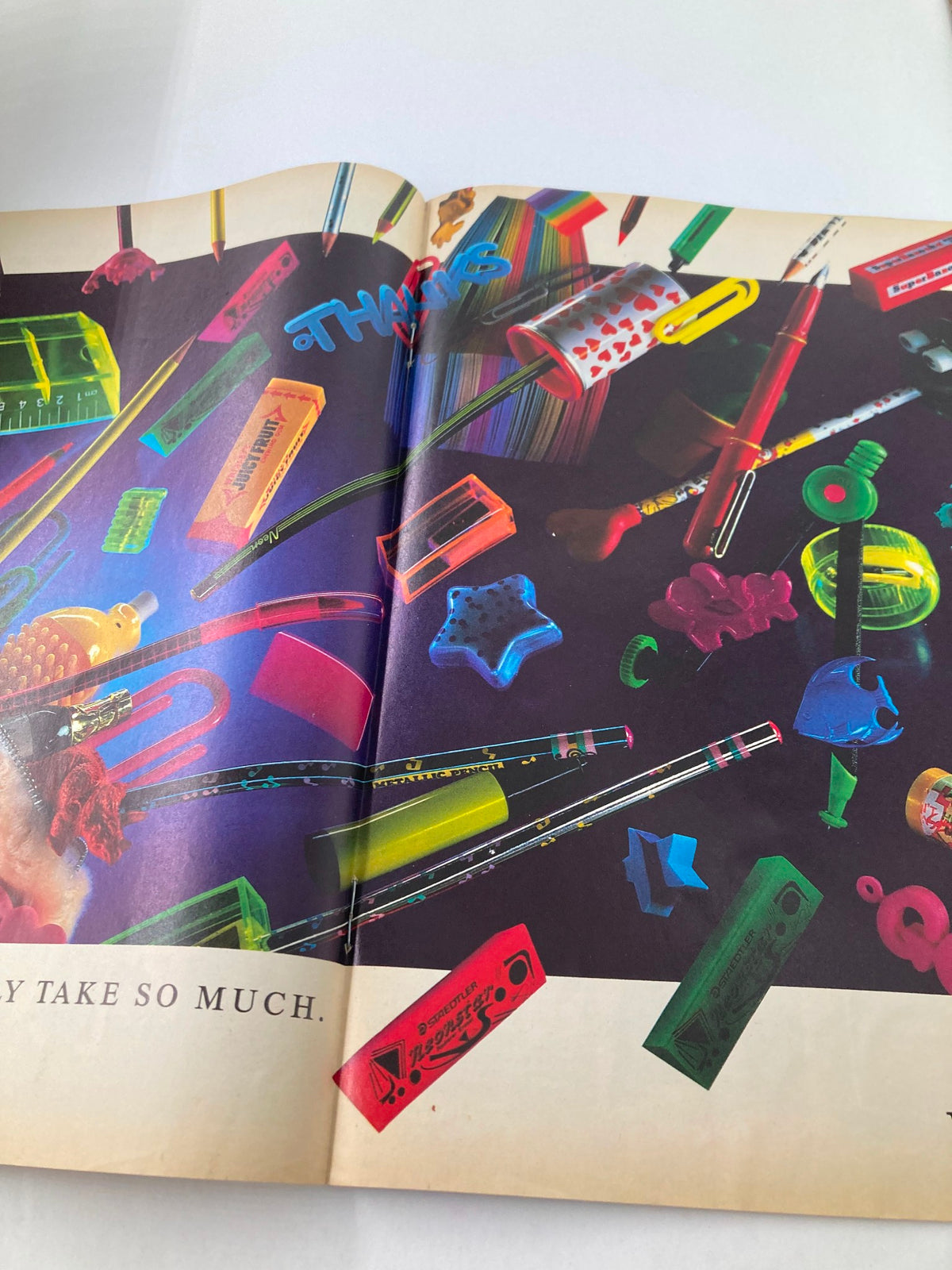 Interior page of Vintage Lookin Magazine May 24 1986 showcasing colorful stationery items and school supplies in a playful arrangement.