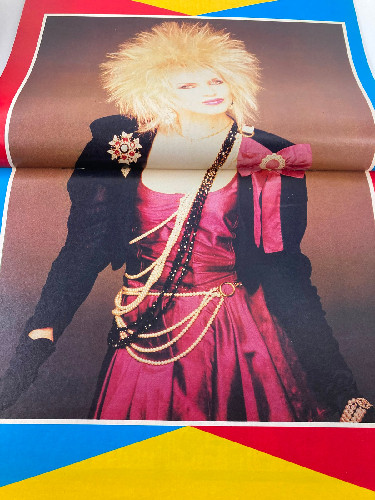 Inside spread of VTG Lookin Magazine September 12, 1987 #38 showcasing a fashion model with spiked blonde hair and a glamorous outfit, representing the fashion trends of the late 1980s.