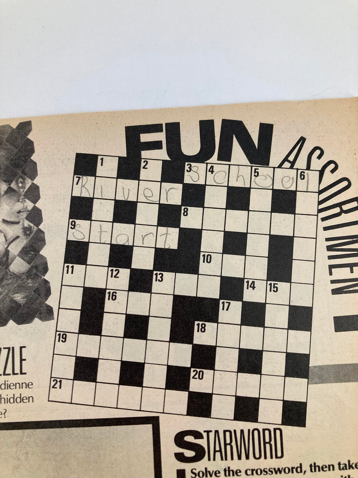 Inside page of the Lookin Magazine August 9, 1986, issue #33 displaying a crossword puzzle titled 'Fun Asortment' with handwritten answers.