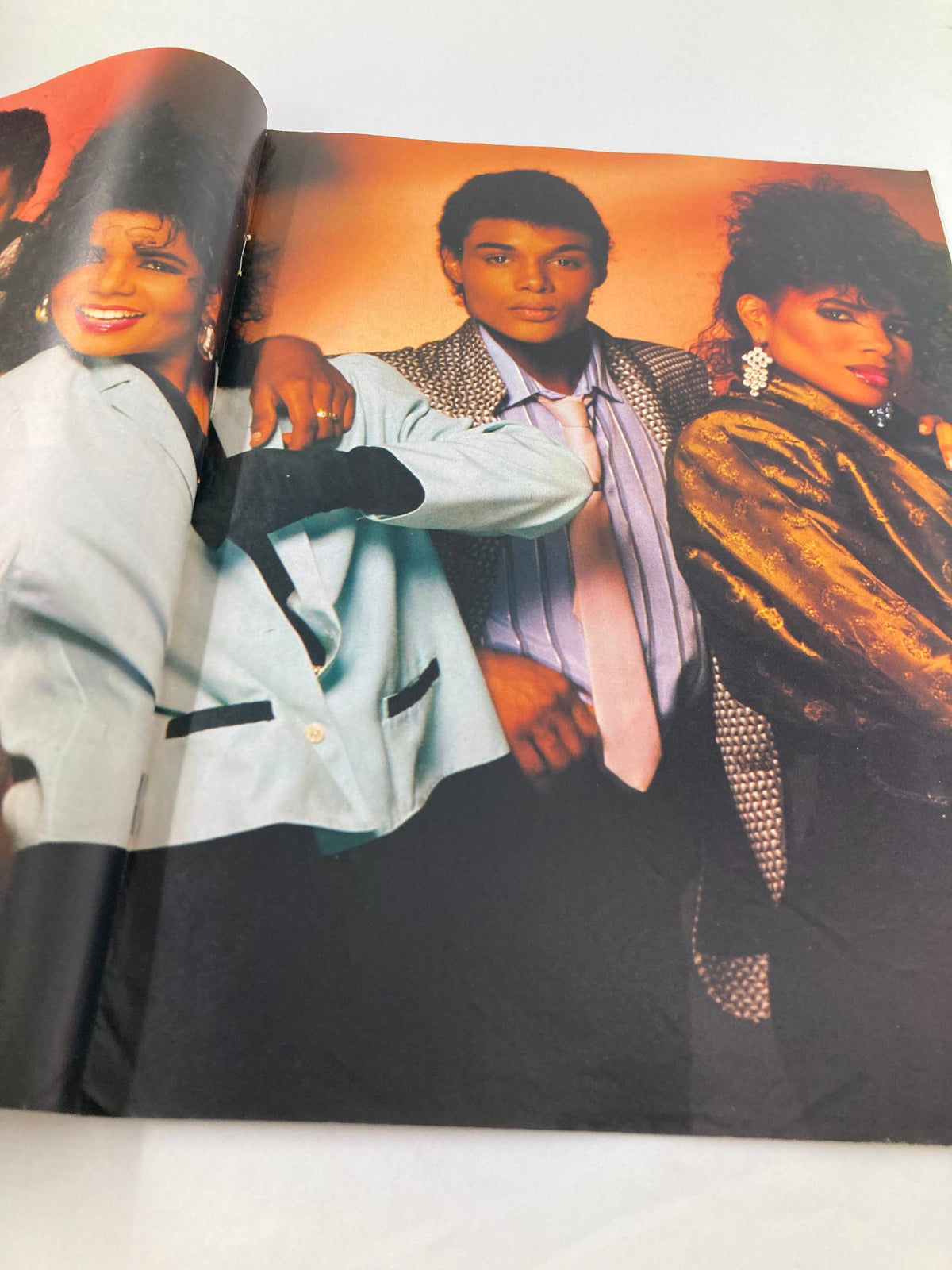 Another view of the centerfold from the Lookin Magazine August 9, 1986, issue #33, featuring a stylish group photo of 80s fashion and expressions.