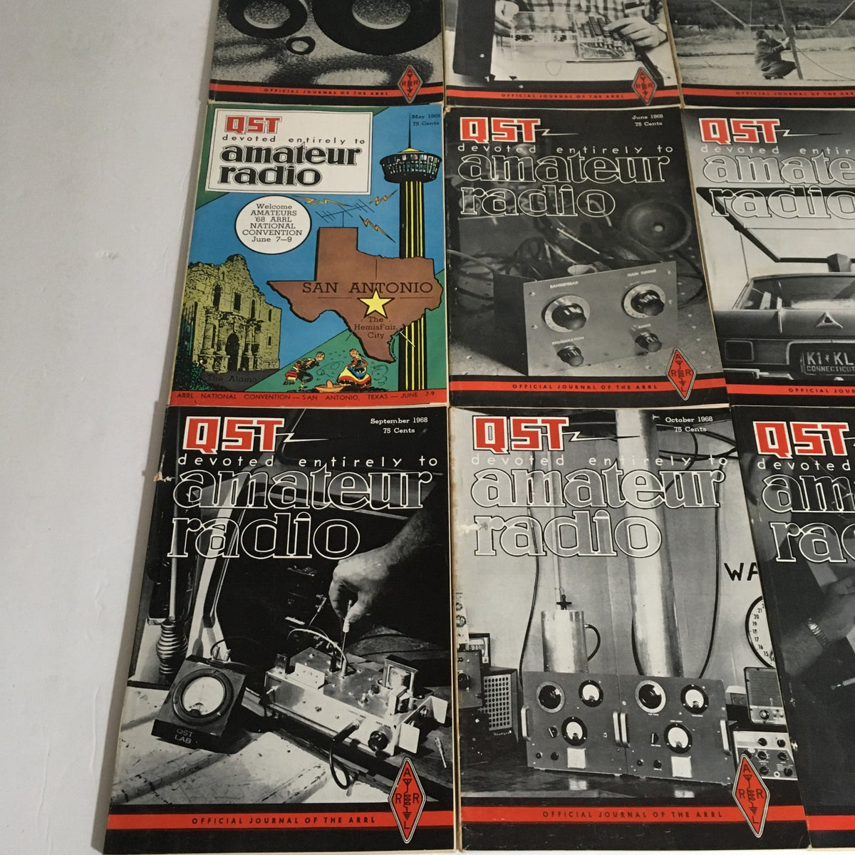 Set of September to December 1968 QST Amateur Radio magazines, featuring diverse articles and illustrations related to the amateur radio community.