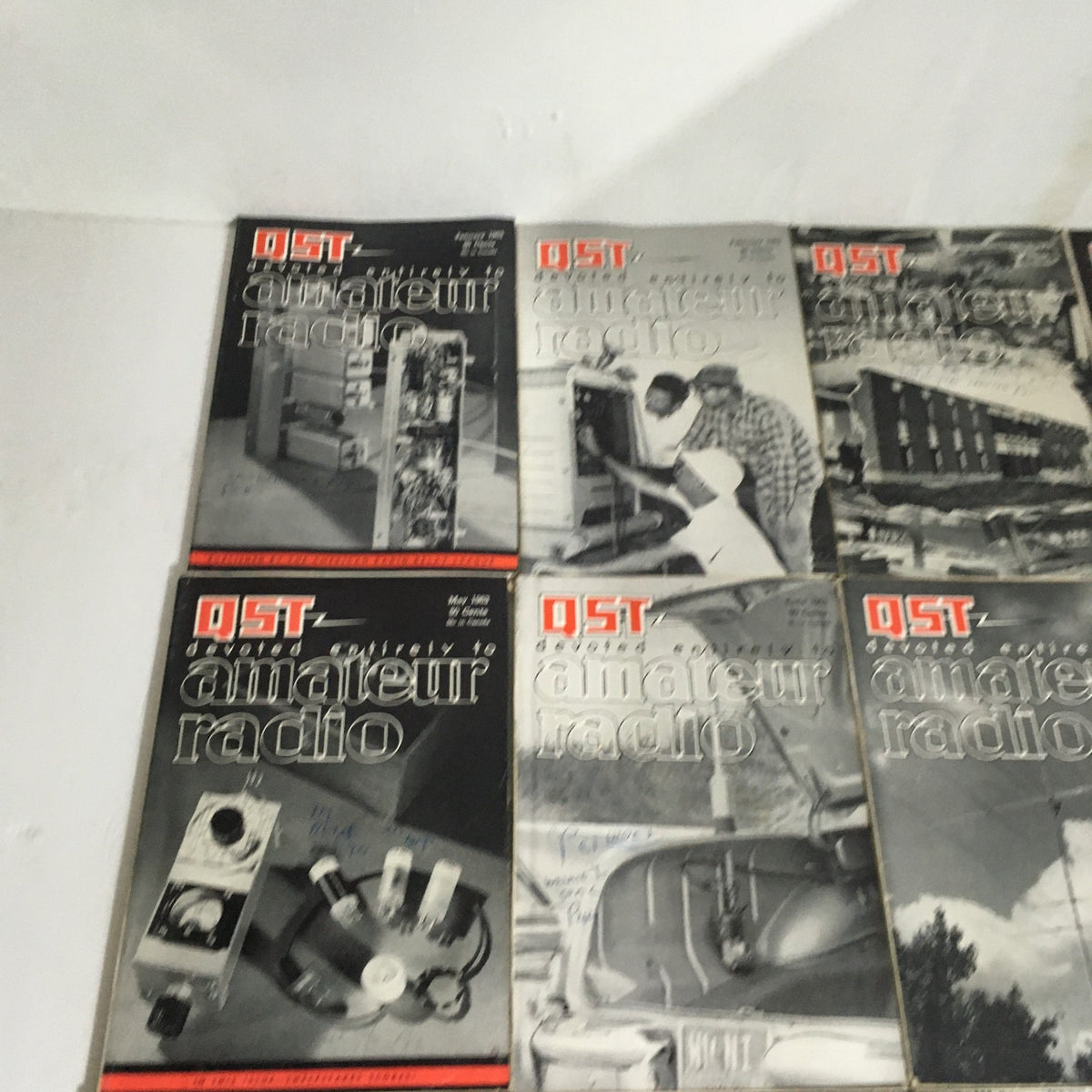 Lot of 12 Complete January to December 1963 QST Amateur Radio Volume 1-12 showing magazine covers with vintage amateur radio themes.