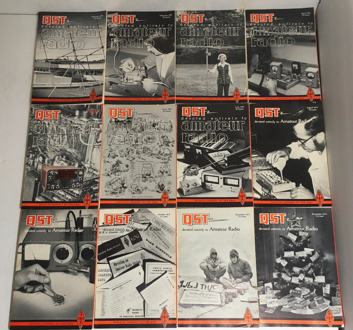 Lot of 12 Complete January to December 1973 QST Amateur Radio Volume 1-12 covers featuring various black and white images and amateur radio themes.