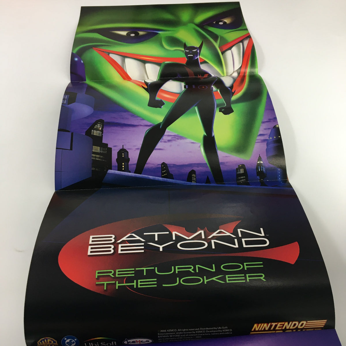 Collectible poster from Nintendo Power Magazine #137 October 2000, featuring Batman Beyond: Return of the Joker, showcasing iconic characters and vibrant artwork.
