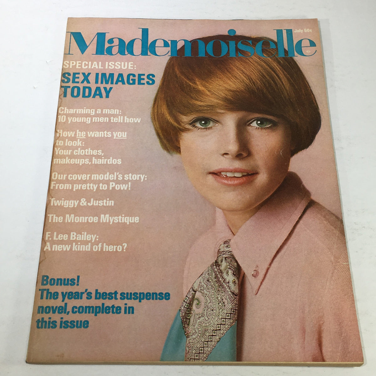 Vintage Mademoiselle Magazine cover from July 1967 featuring the title 'The Monroe Mystique' with a model showcasing 1960s fashion and style. This issue highlights topics like beauty and lifestyle, capturing the essence of the era.