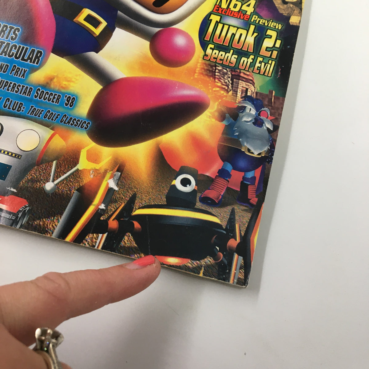 Close-up of the cover of Nintendo Power Magazine #111 from August 1998 featuring Bomberman Hero, highlighting game graphics and characters.