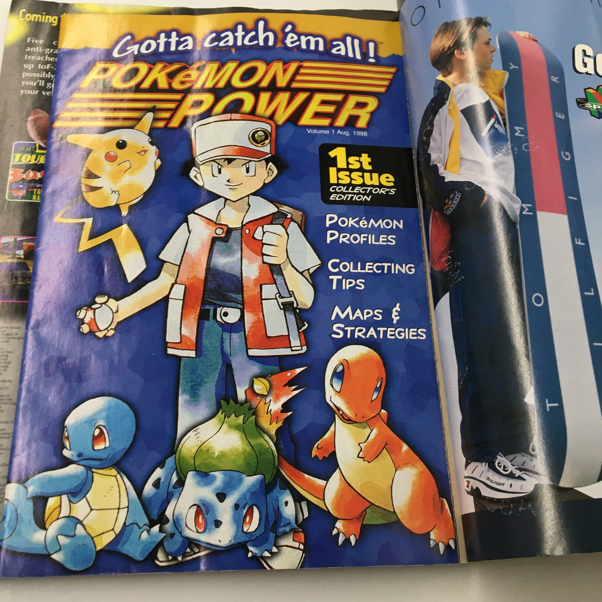 Collector's edition cover of Pokémon Power Magazine from August 1998, featuring Pokémon characters and strategies for collectors.