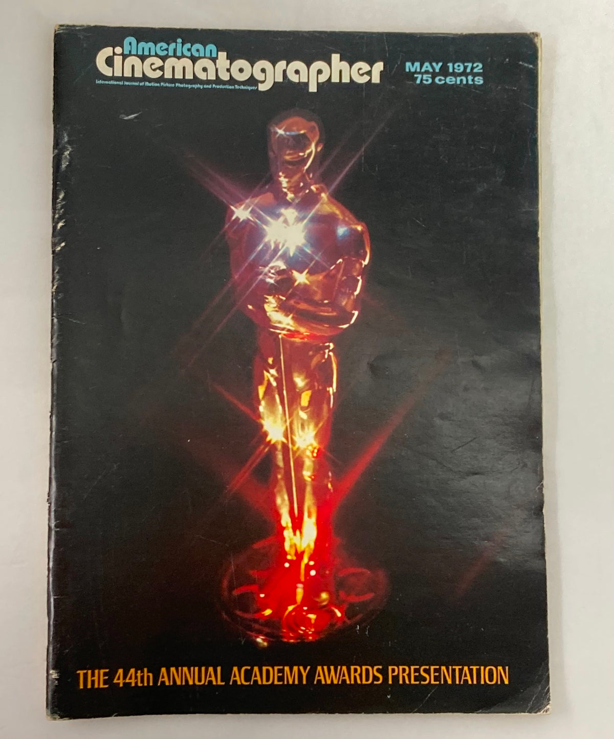 Cover of American Cinematographer Magazine May 1972 featuring the Academy Award 'Oscars' Statuette with vibrant lights and the title 'THE 44th ANNUAL ACADEMY AWARDS PRESENTATION'.