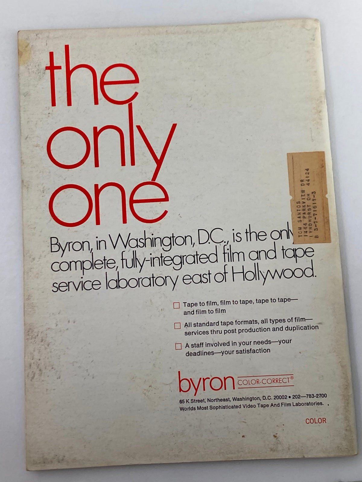 Back cover of American Cinematographer Magazine July 1975, displaying advertisement for Byron, a complete film and tape service laboratory, highlighting its services in the film industry.