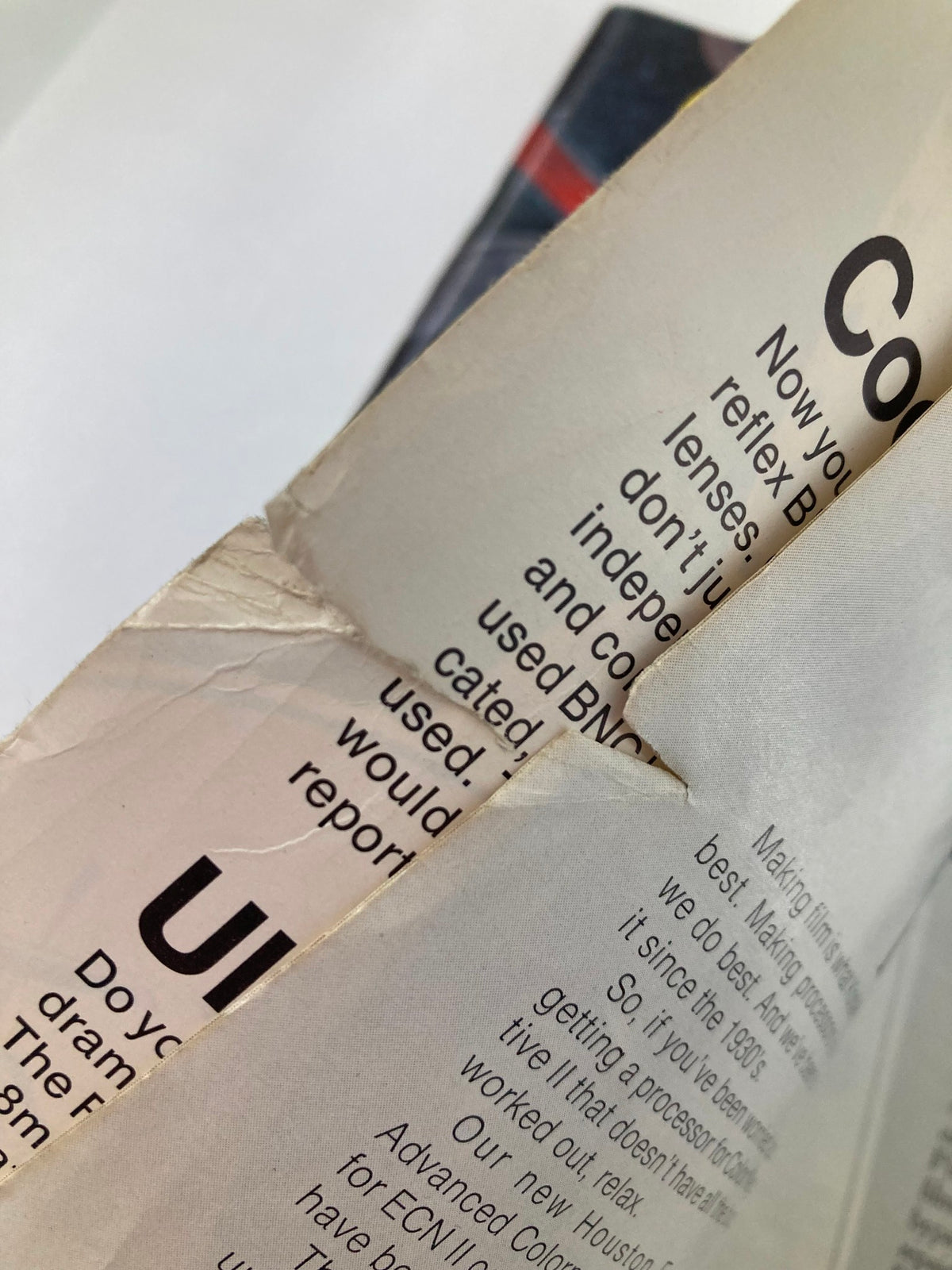 Close-up of the spine and binding of American Cinematographer Magazine, June 1974, showing visible wear and creasing characteristic of vintage publications.