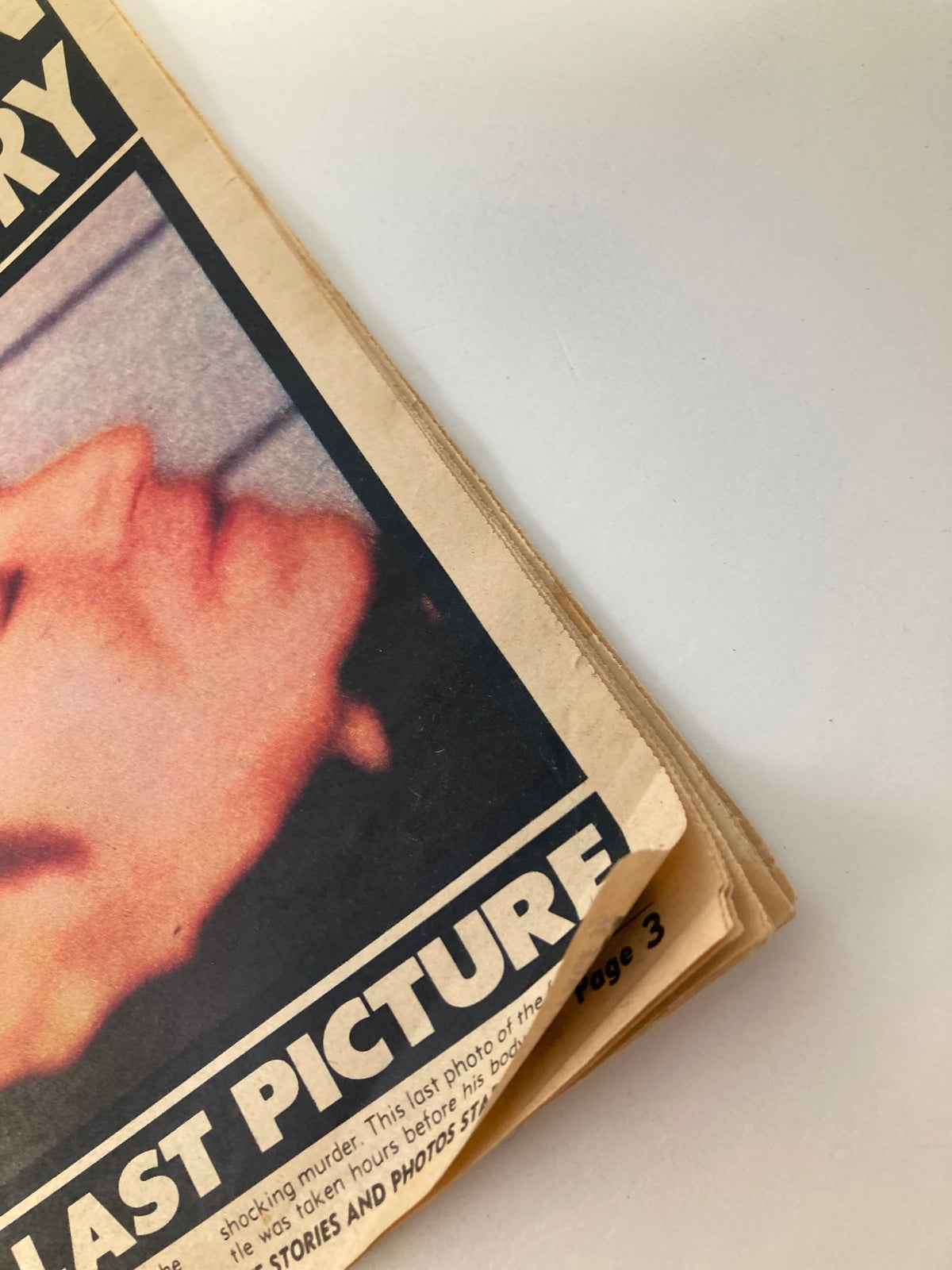 National Enquirer Tabloid December 30 1980 John Lennon The Untold Story showing the corner of the magazine with creases and wear.