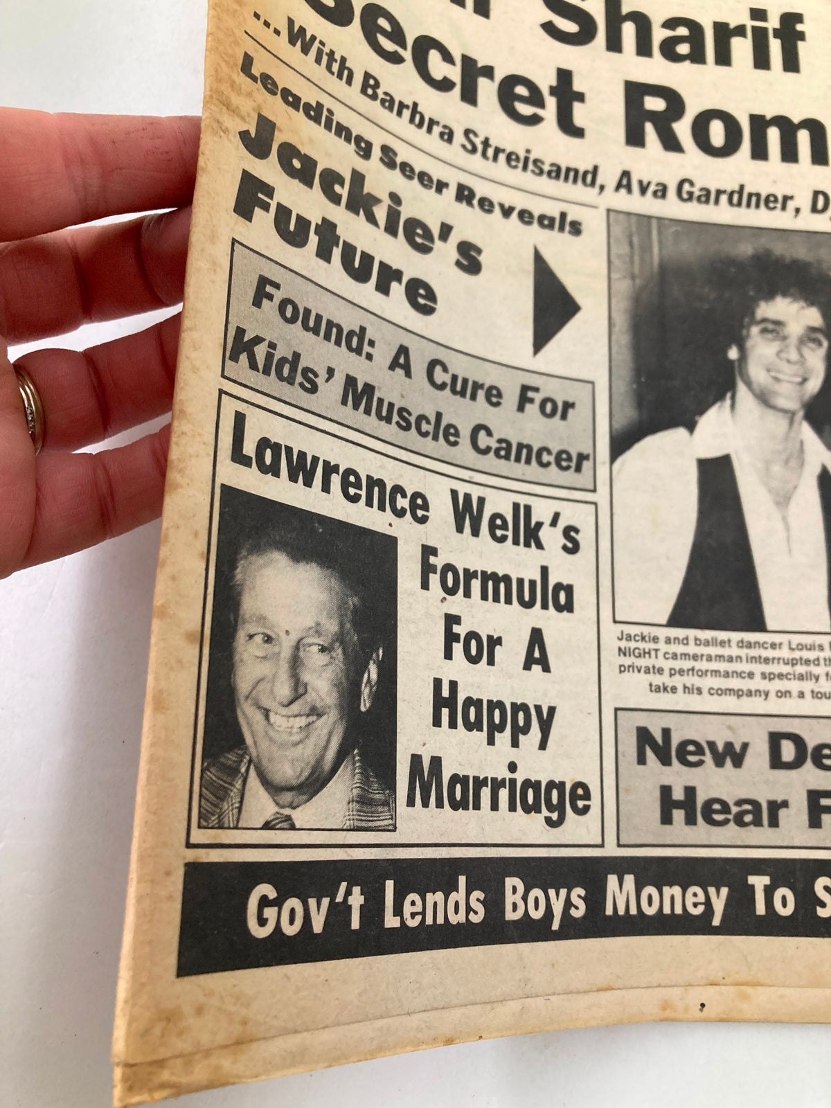 Close-up of the Midnight Tabloid July 19 1976 Vol 23 #4 showing Lawrence Welk with the headline about his 'Formula for a Happy Marriage.' The image captures a vintage newspaper layout and offers insight into popular culture of the time.