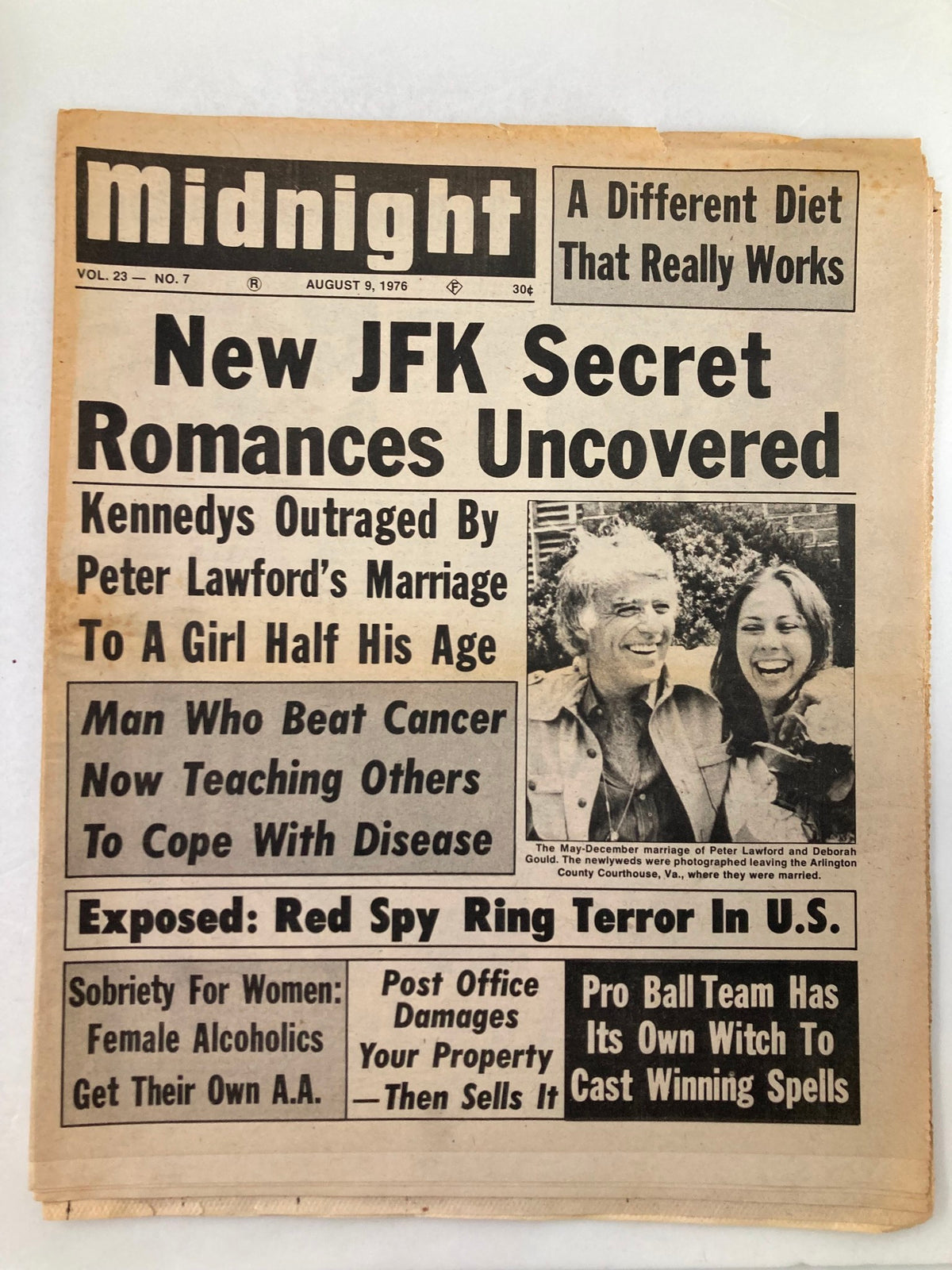 Midnight Tabloid August 9, 1976 Vol 23 #7 featuring Peter Lawford and Deborah Gould's marriage, discussing JFK secrets and more, in good condition with some minor wear noted.