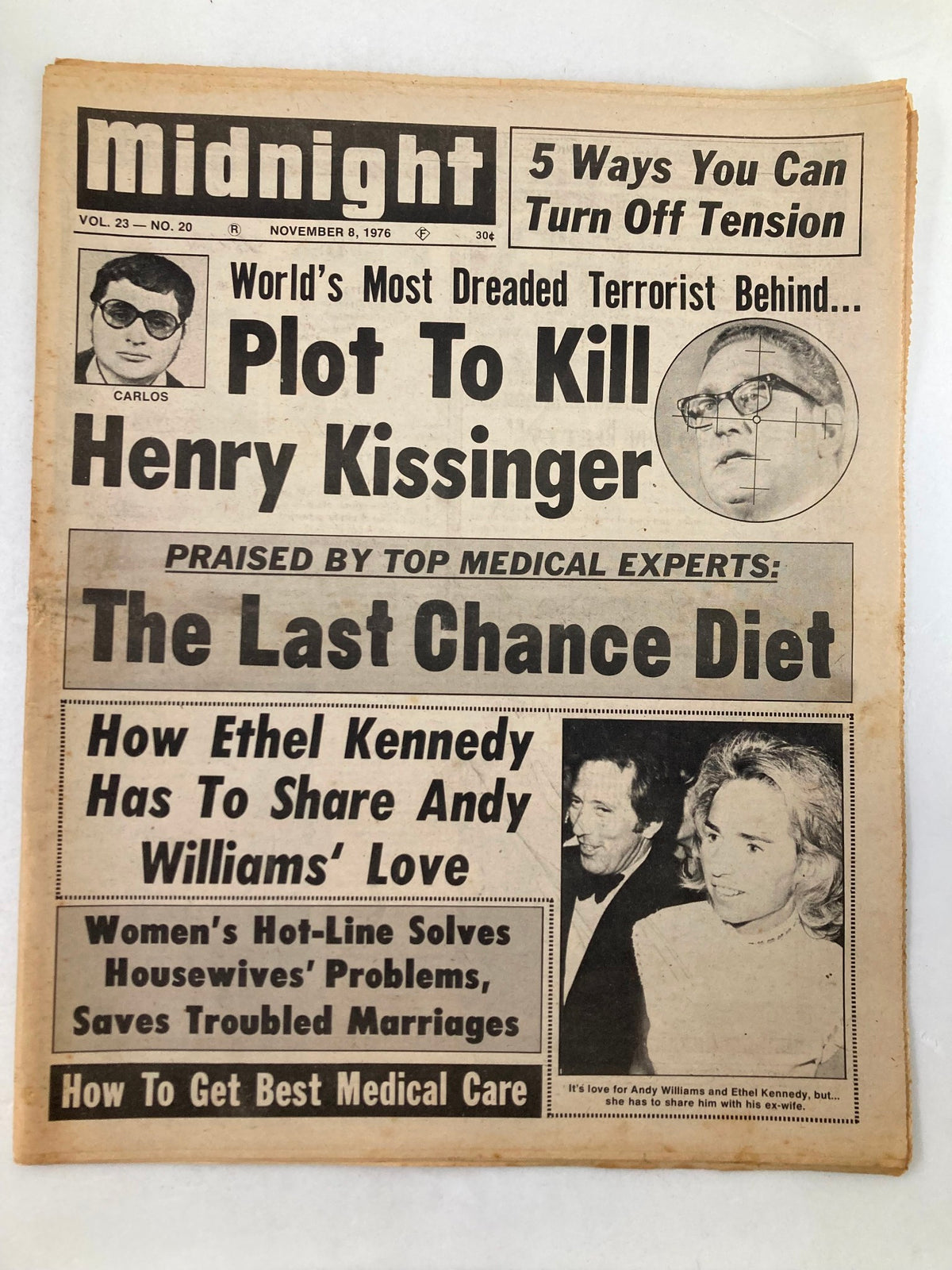 Midnight Tabloid November 8, 1976, Vol 23 #20, featuring the headline 'Plot To Kill Henry Kissinger' with images and articles reflecting 1970s political intrigue.