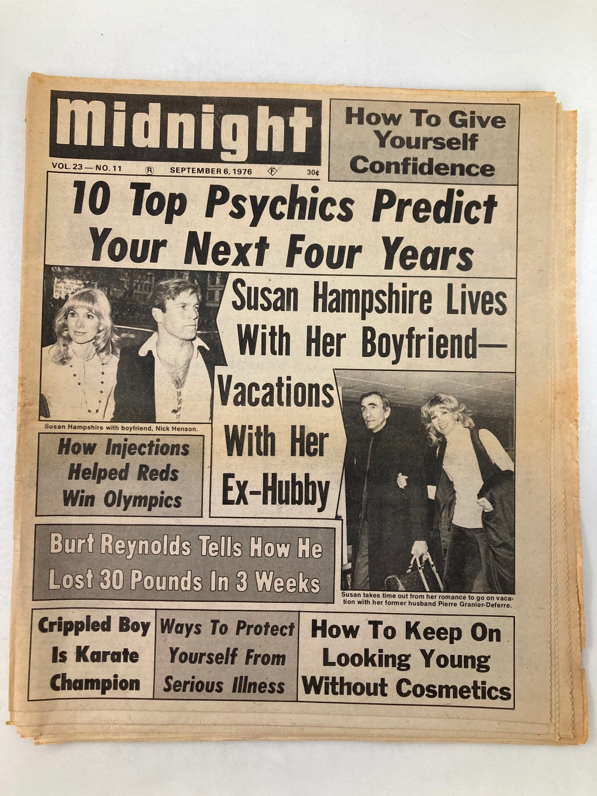 Midnight Tabloid September 6 1976 Vol 23 #11, featuring the headline '10 Top Psychics Predict Your Next Four Years'. The cover includes images of Susan Hampshire, her boyfriend, and Nick Henson, highlighting various articles related to lifestyle and personal development.