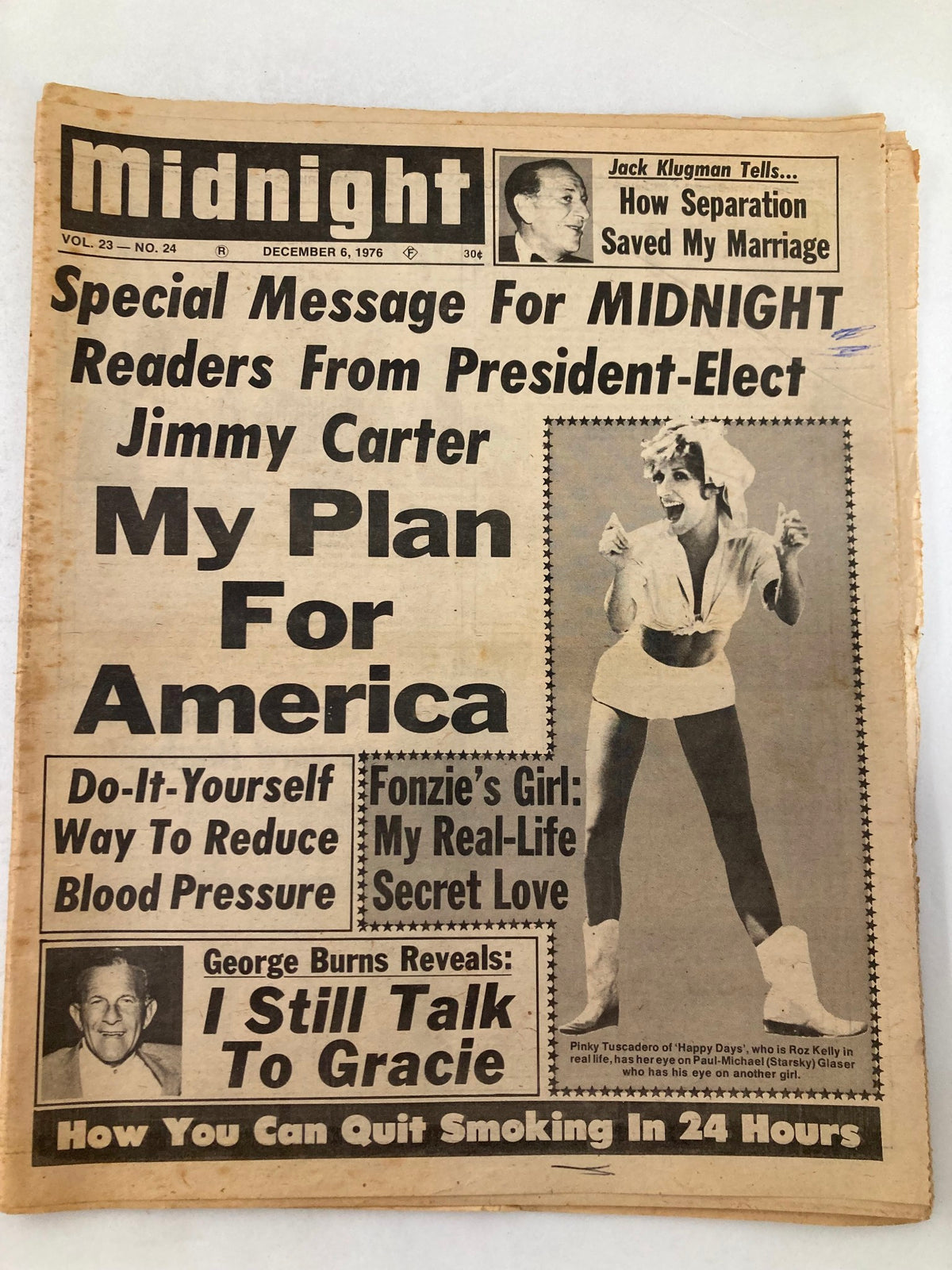 Midnight Tabloid December 6 1976 Vol 23 #24 featuring Pinky Tuscadero, George Burns, and a special message from President-Elect Jimmy Carter. Cover highlights include advice on reducing blood pressure and tips for quitting smoking.