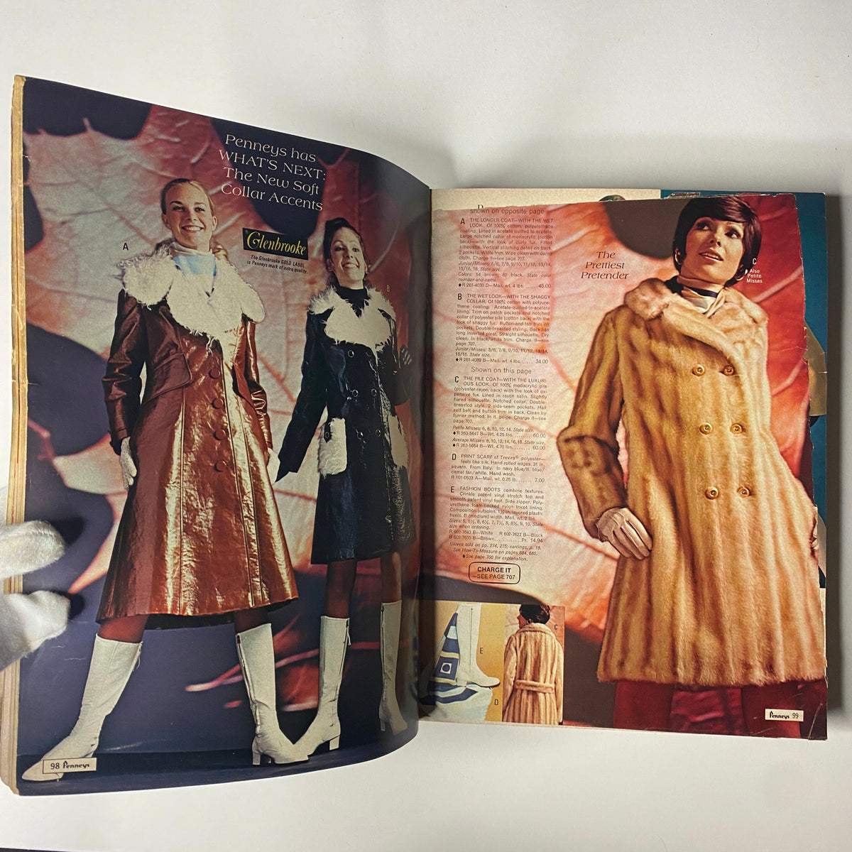Inside spread of the 1970 JC Penneys Fall and Winter Store Catalog highlighting outerwear options, including fashionable coats with soft collars and boots.