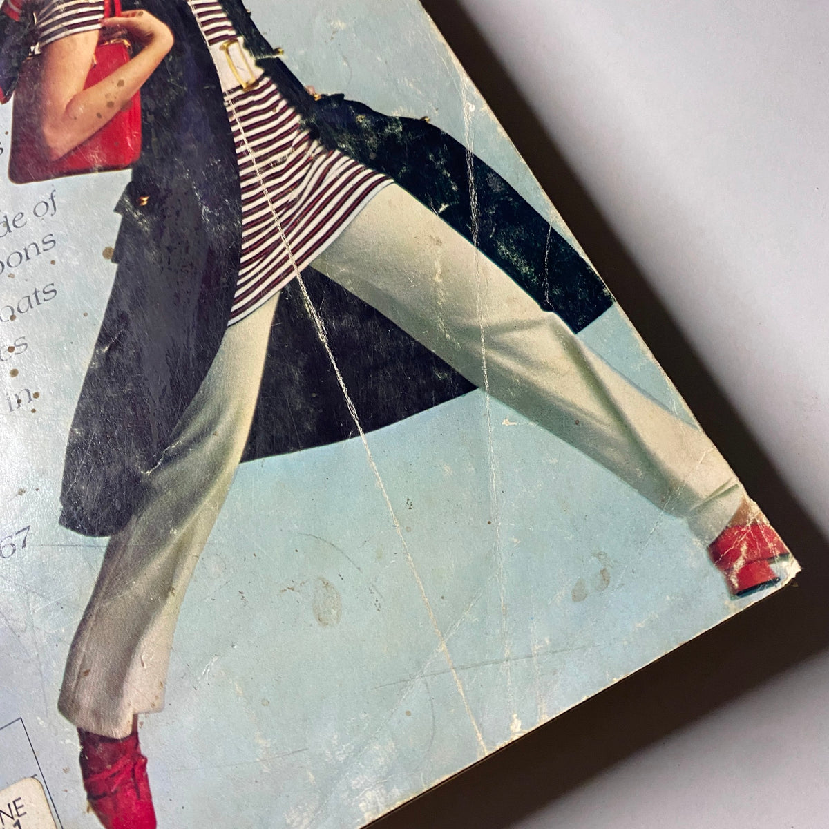 Back cover of the 1971 JC Penneys Spring and Summer Store Catalog displaying a model in a striped shirt and loose pants, emphasizing retro fashion and outdoor style.