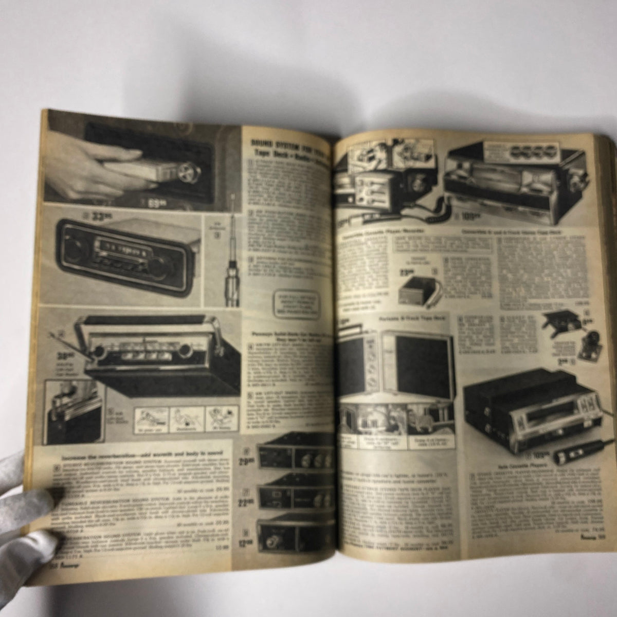 1971 JC Penneys Spring and Summer Store Catalog showcasing various audio equipment, including a radio and tape deck, highlighting technology from the early 1970s.