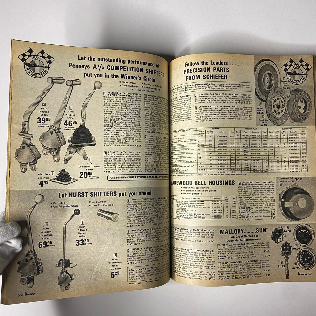 1971 JC Penneys Spring and Summer Store Catalog presenting automotive parts including competition shifters from Penneys A/fx Racing Team.
