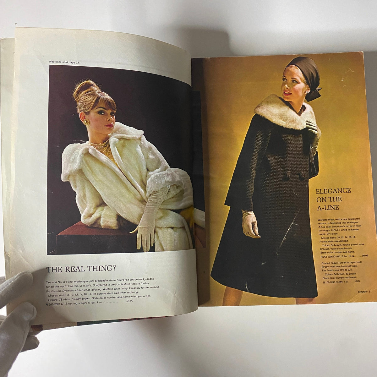 1964 JC Penneys Fall and Winter Store Catalog showcasing elegant fashion with models in stylish coats and accessories, featuring vintage photography.
