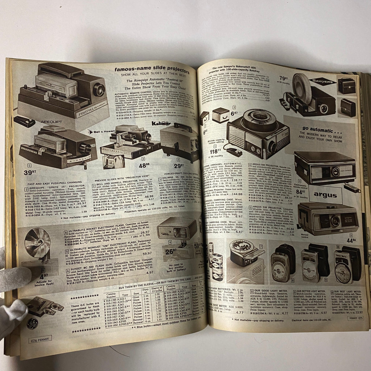 1964 JC Penneys Fall and Winter Store Catalog featuring a page of famous-name slide projectors with detailed descriptions and prices.