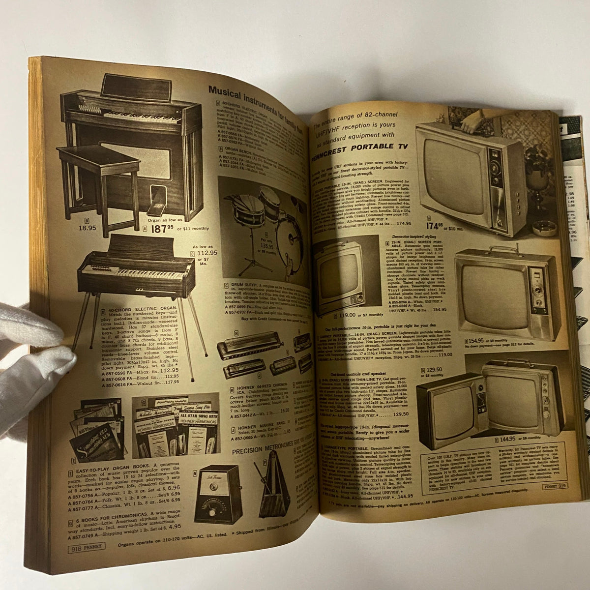 1964 JC Penneys Spring and Summer Store Catalog displaying musical instruments such as organs and televisions emphasizing mid-century technology and design.