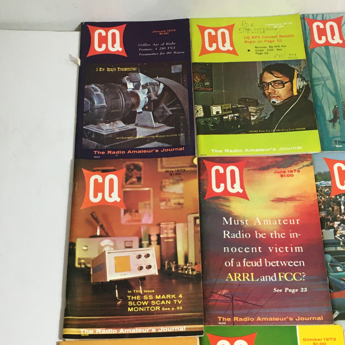 Lot of 12 Complete January to December 1973 CQ The Radio Amateur's Journal magazines displayed together, featuring covers from various months including January, February, May, and June 1973, each labeled with distinct titles and images relevant to amateur radio.