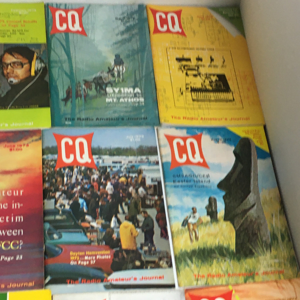 Collection of 12 complete issues from January to December 1973 of CQ The Radio Amateur's Journal, featuring various covers showcasing amateur radio themes.