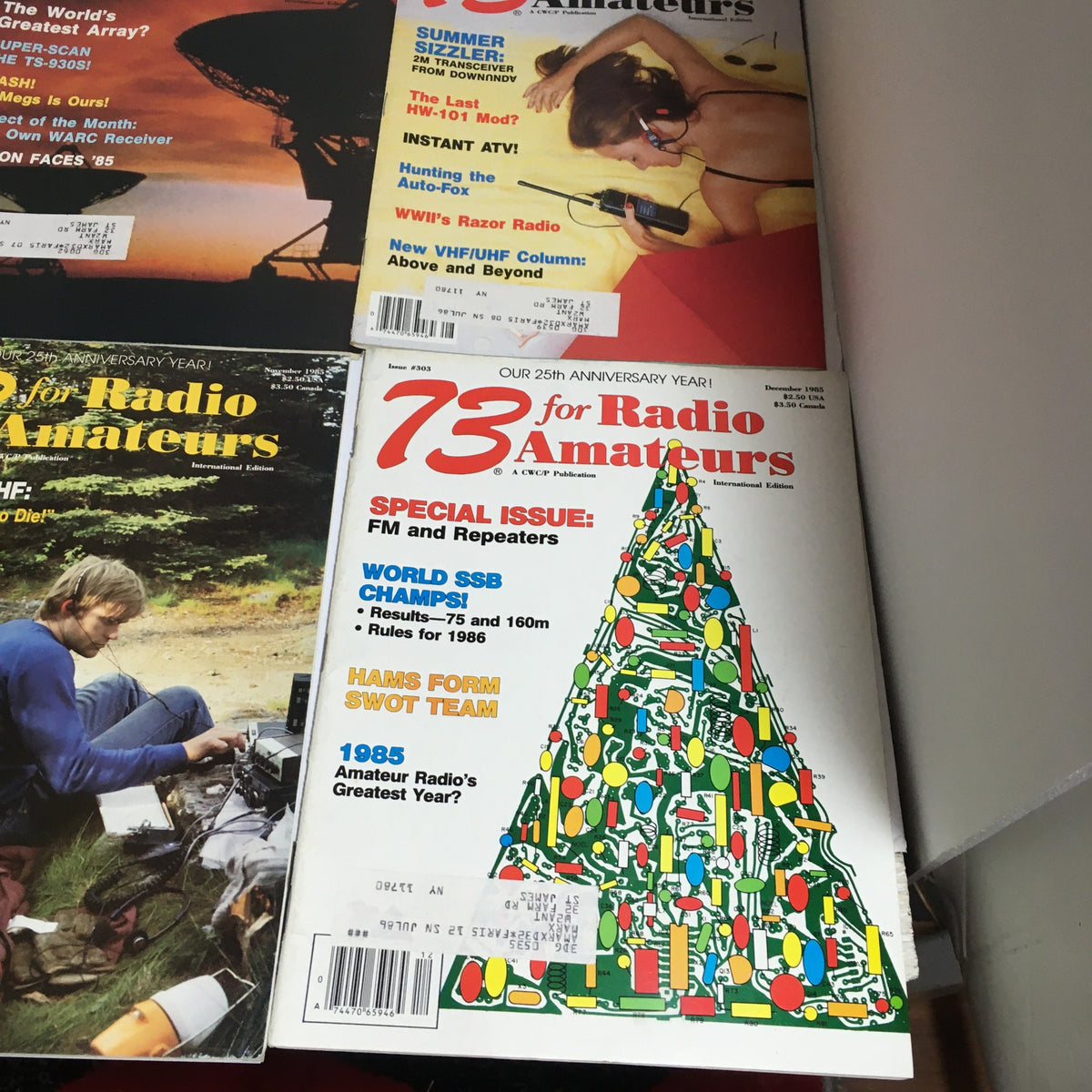 Cover of December 1985 issue of 73 Amateur Radio magazine showcasing a holiday-themed design with a tree made of radio equipment, part of the Lot of 12 Complete January to December 1985 73 Amateur Radio collection.