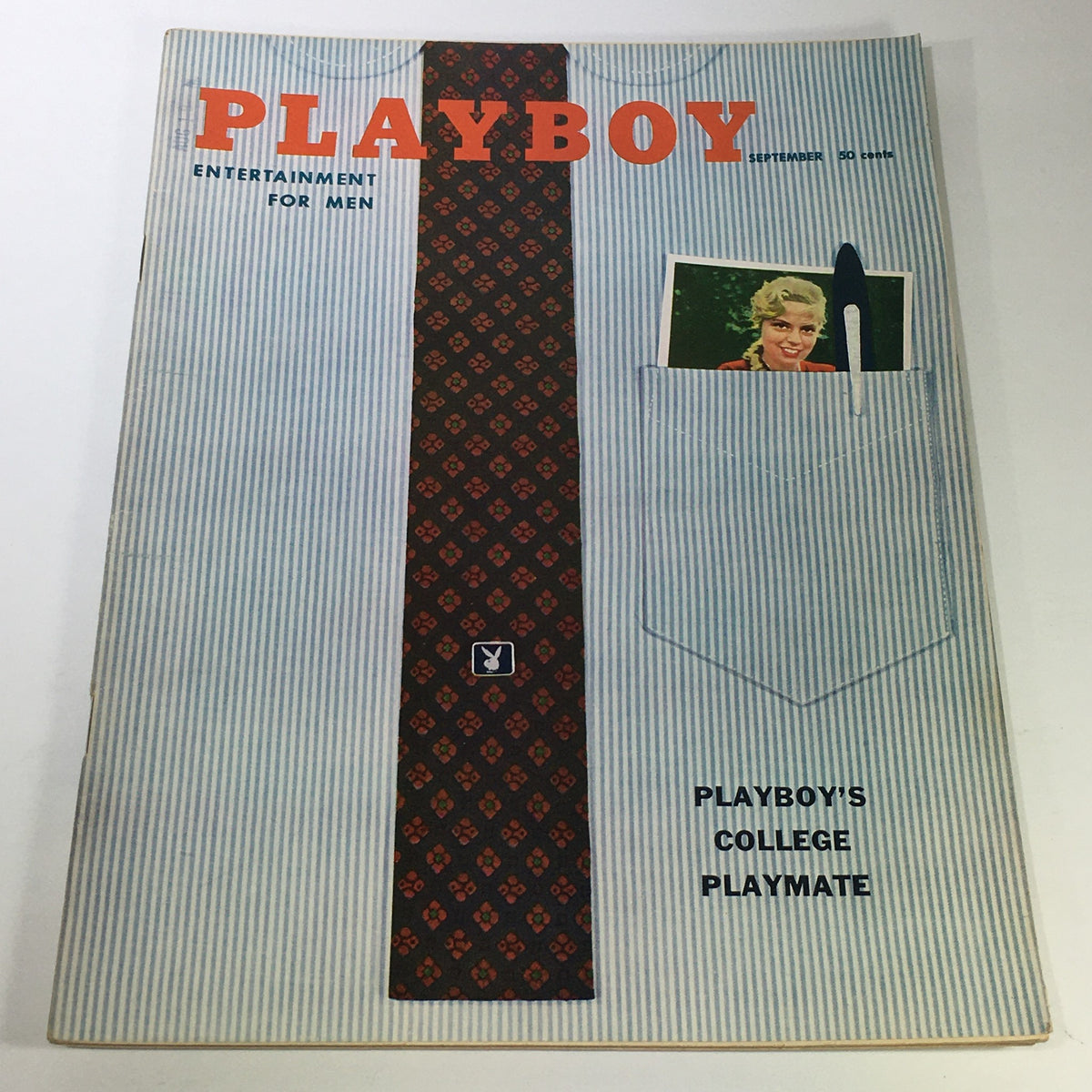 VTG Playboy Magazine from September 1958 featuring Playboy's College Playmate, showcasing a unique cover design with a striped background and a pocket with a photo.