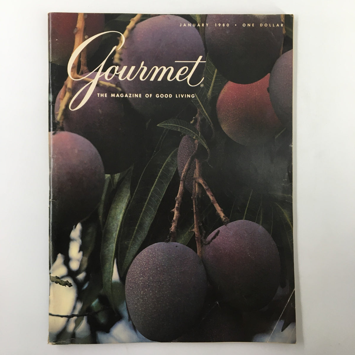 Cover of VTG Gourmet Magazine January 1980 showcasing Juicy Haden Mangoes with lush tropical flora, highlighting the magazine's theme of gourmet living.
