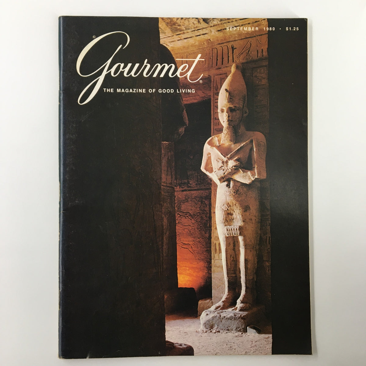 Cover of the September 1980 issue of Gourmet Magazine featuring the Temple of Ramses II at Abu Simbel, showcasing a statue in an ancient Egyptian cave.