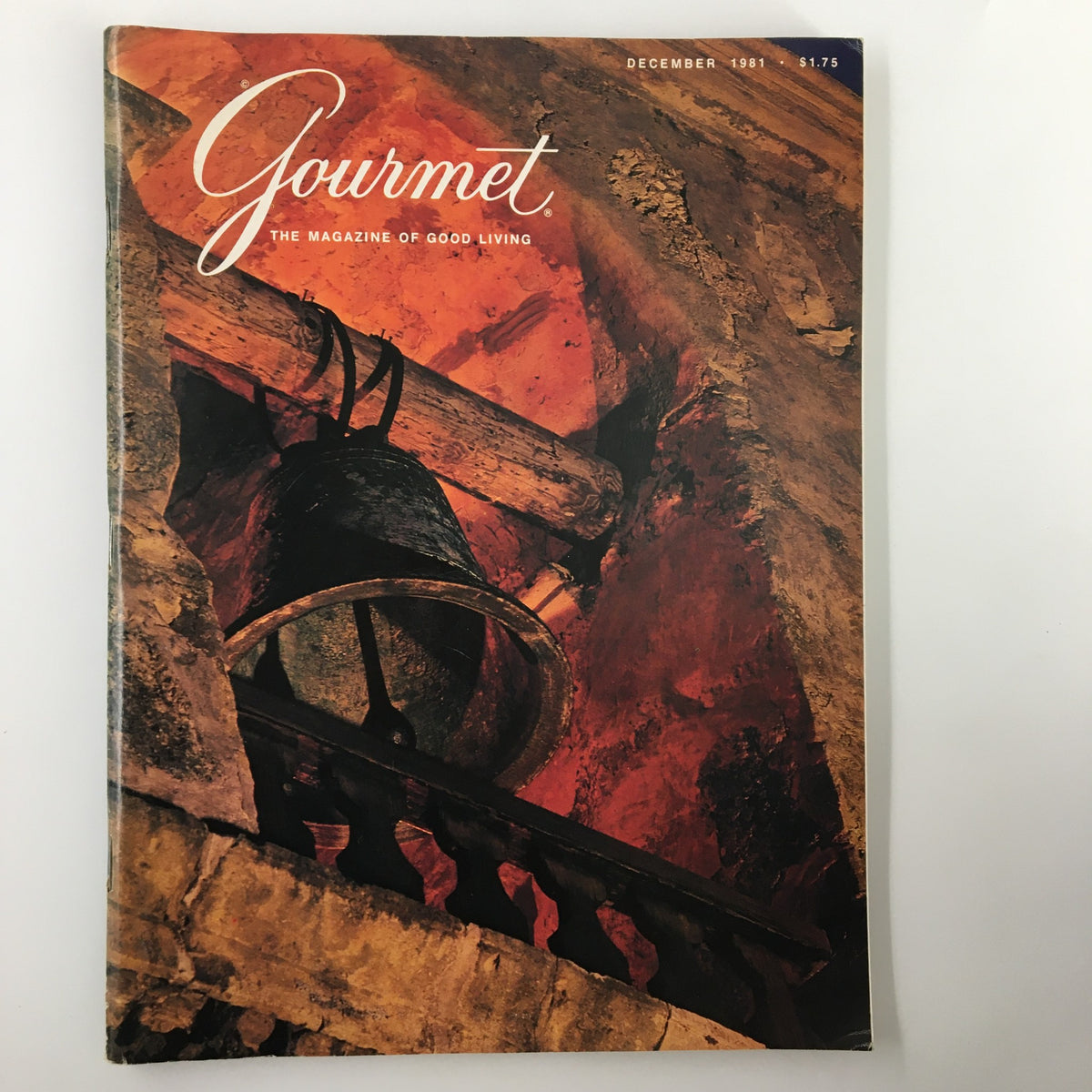 Cover of VTG Gourmet Magazine December 1981 featuring a bell and rustic architecture, representing the theme 'Twenty-One Missions El Camino Real'.