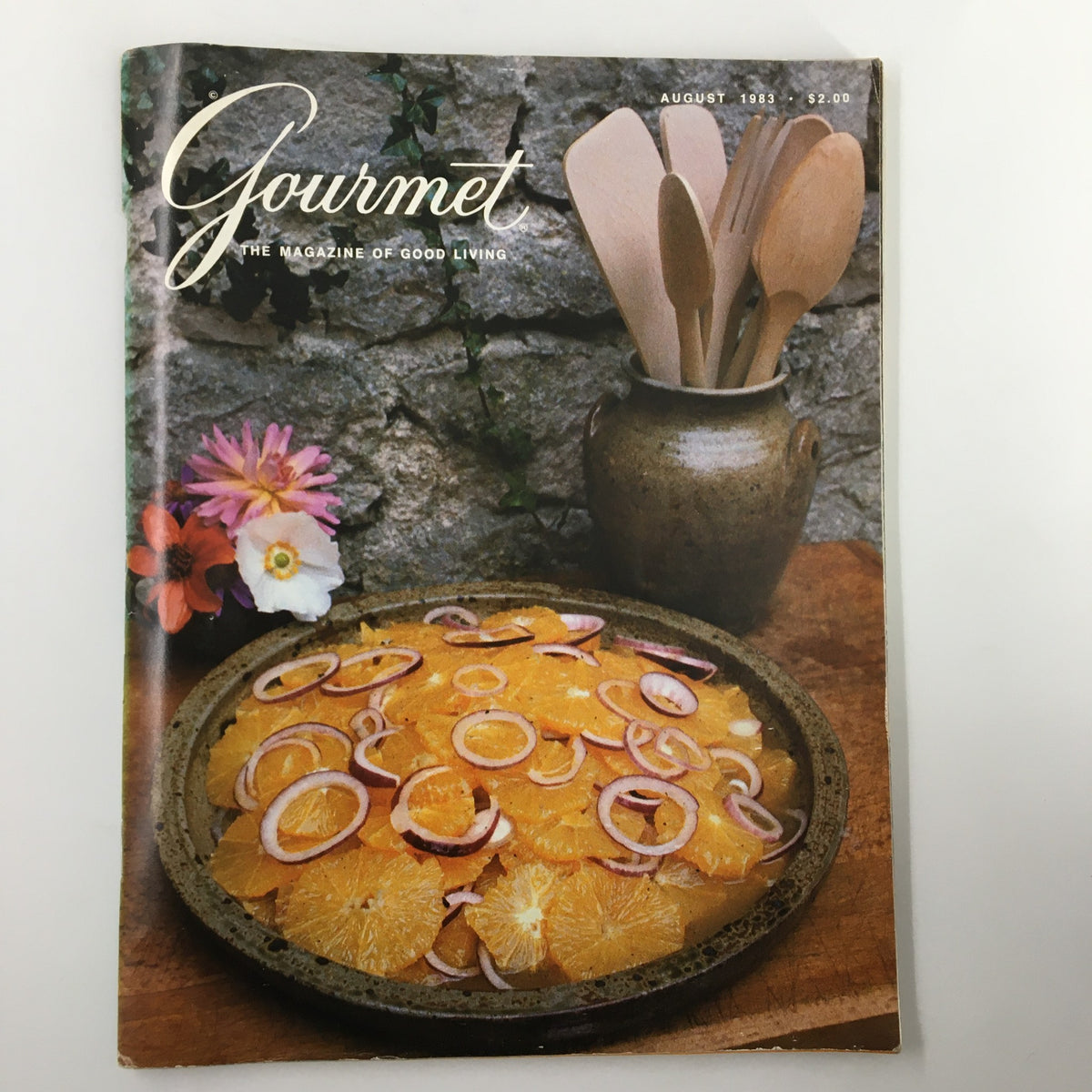Vintage Gourmet Magazine August 1983 cover featuring Orange and Red Onion Salad with vibrant colors and culinary elements.