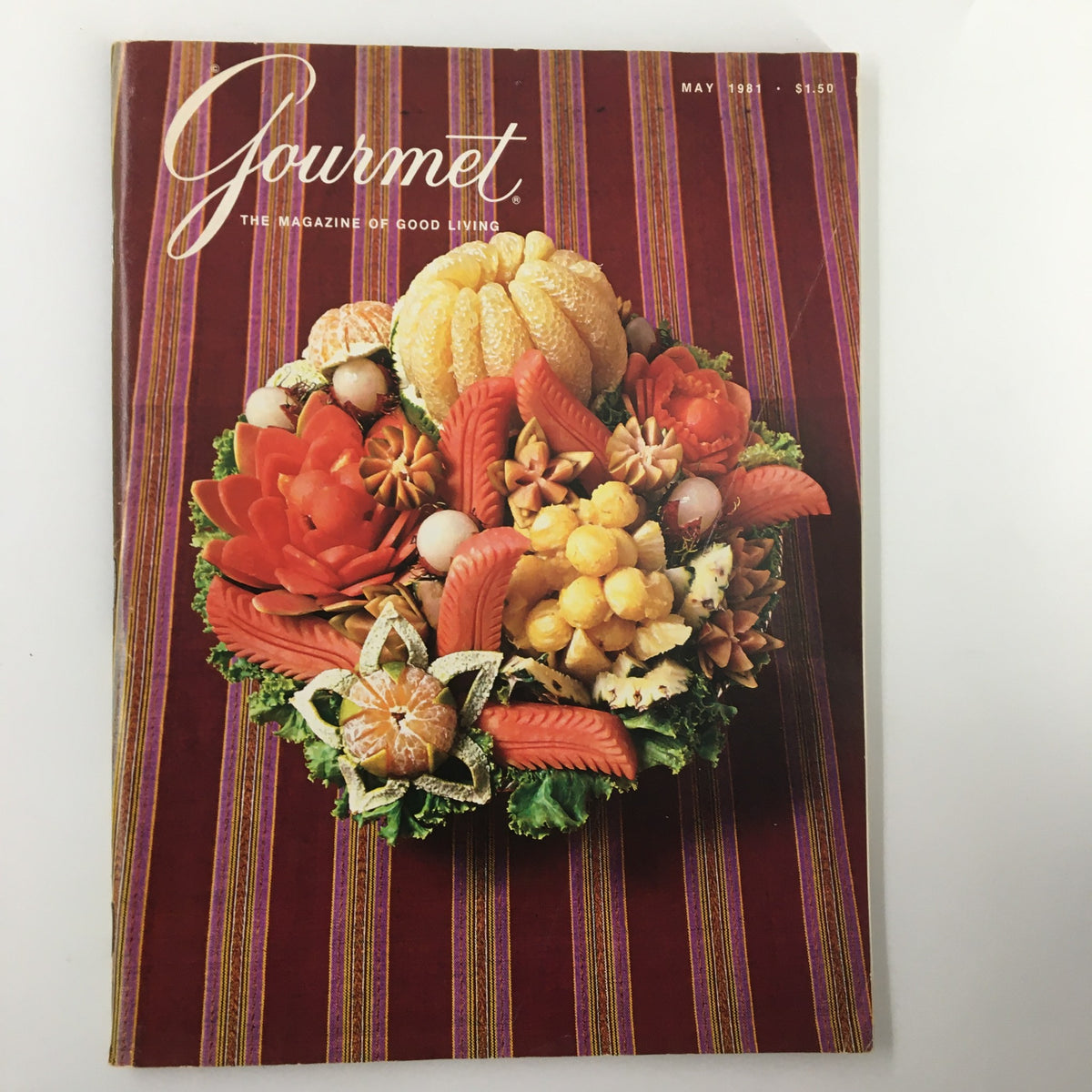 Cover of VTG Gourmet Magazine May 1981 featuring an intricately carved basket of local fruits. The vibrant cover design reflects the culinary culture of the early 1980s.