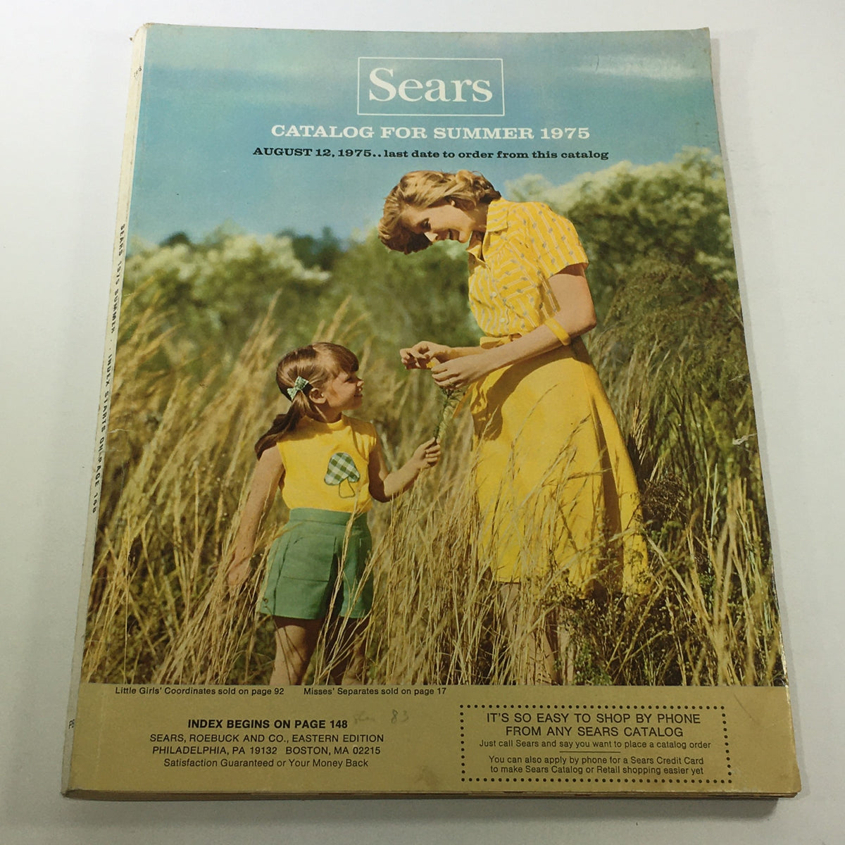 Cover of the VTG Sears Catalog: August 12 1975 - Summer Catalog For The Year 1975, featuring a mother and daughter in summer outfits, set against a grassy background.