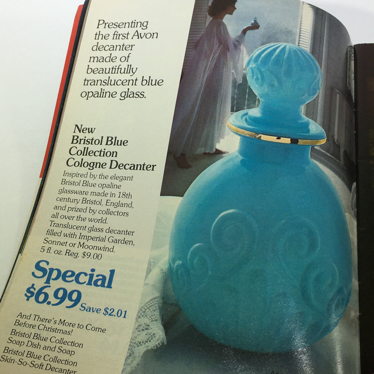 VTG Avon Catalog: 1974 - Fashion Accessory Brochure - The first Avon decanter made of blue opaline glass, showcased with a woman holding it, as seen in the 1974 Avon catalog.