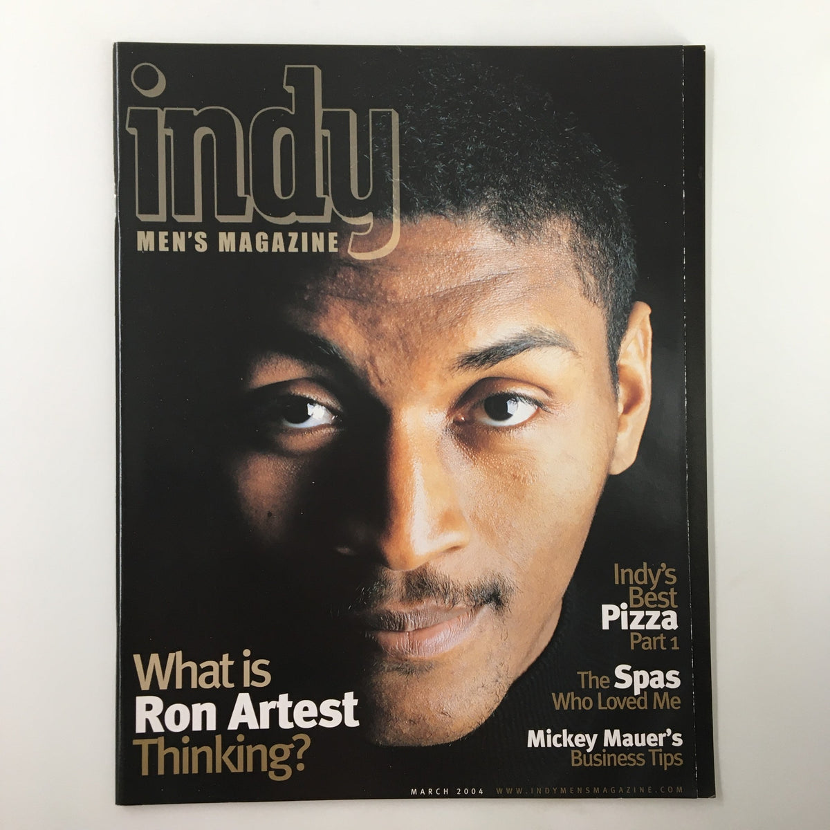 Cover of Indy Men's Magazine March 2004 featuring Indiana Pacers player Ron Artest, showcasing his image and intriguing questions about his thoughts.