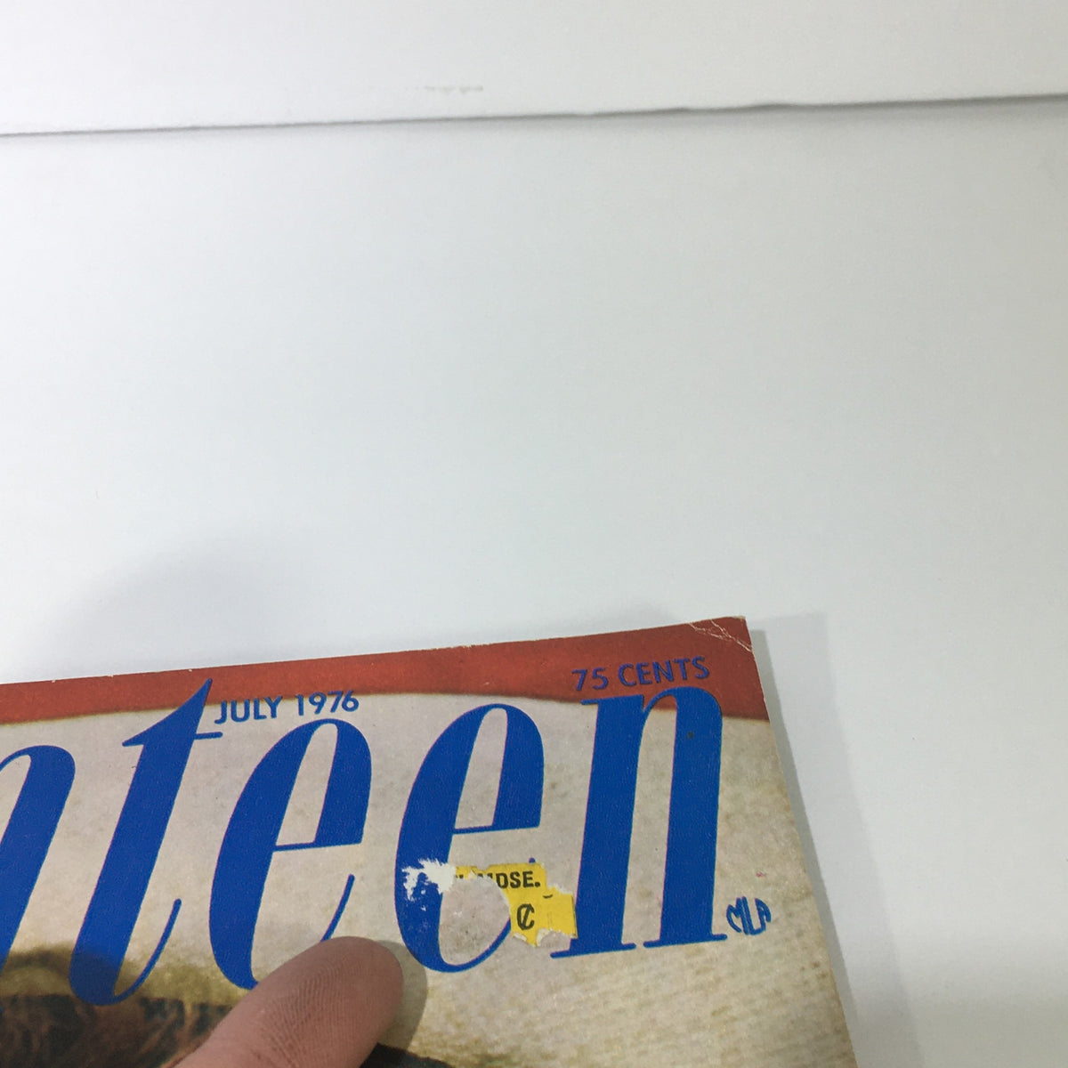 Close-up of the top section of VTG Seventeen Magazine: July 1976 displaying the magazine title, date, and price. This image captures the vintage feel, including the price sticker and slight wear on the magazine cover.