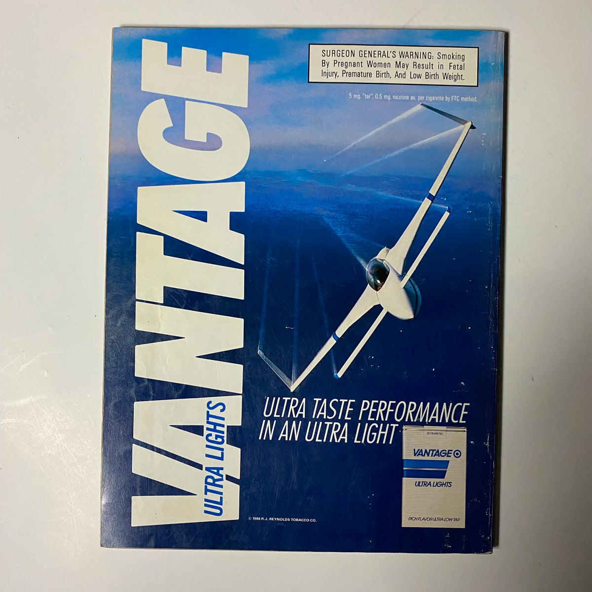 Advertisement page from the Playboy Magazine August 1988 edition, featuring an advertisement for Vantage Ultra Lights cigarettes.