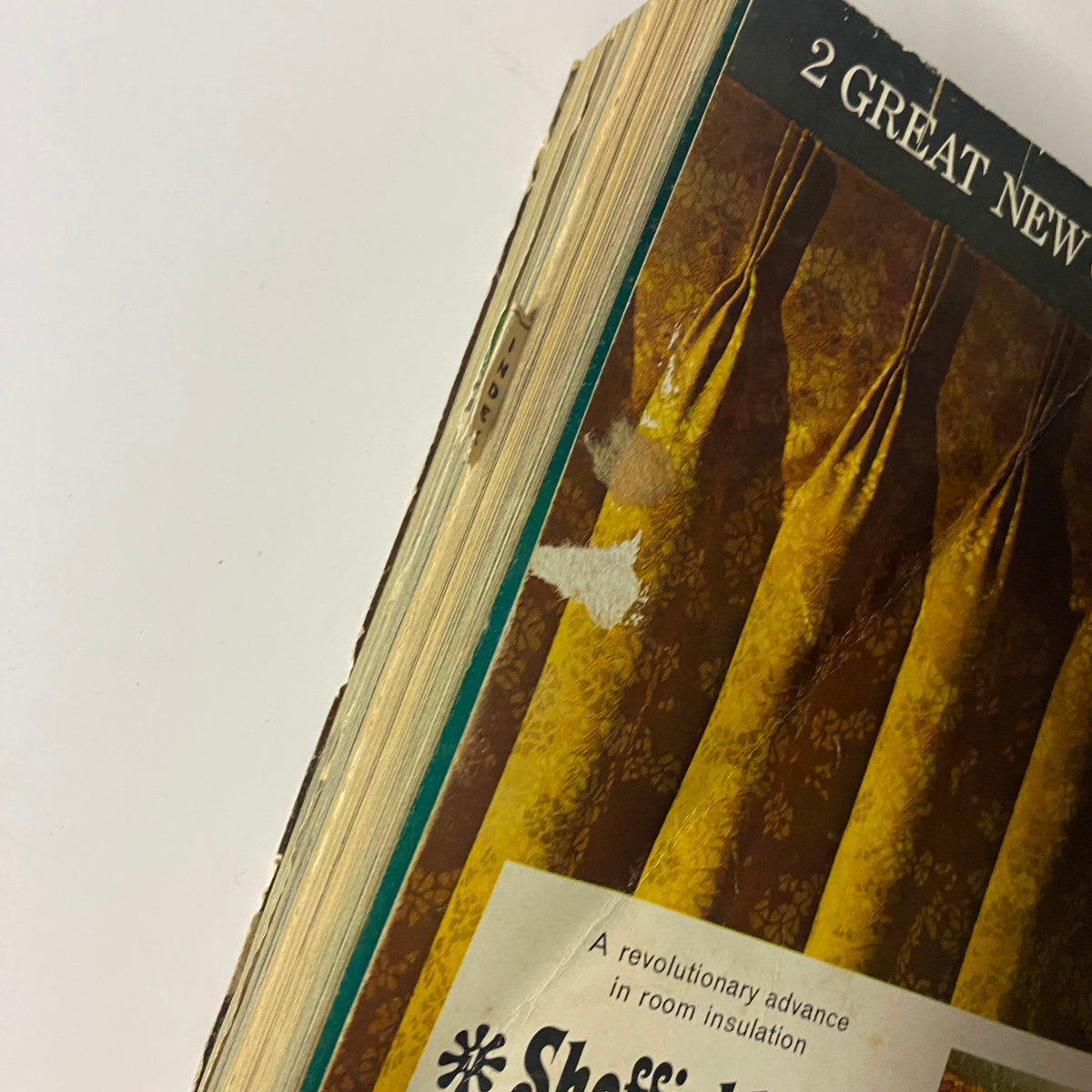 Side view of the 1967 JC Penneys Spring and Summer Store Catalog highlighting its cover and design features, emphasizing its vintage charm.