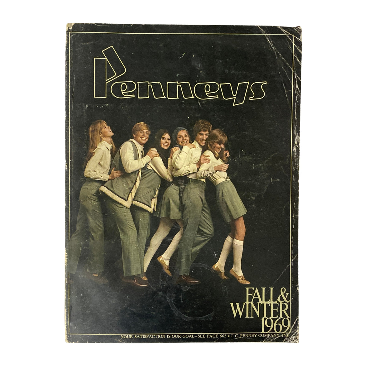 Cover of the 1969 JC Penneys Fall and Winter Store Catalog featuring a group of fashionable models wearing 1960s apparel.