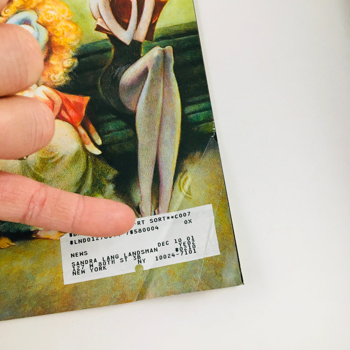 Interior detail of The New Yorker Full Magazine May 15 2000 showing an address label and finger pointing to magazine information, highlighting the collectible aspects of the issue.