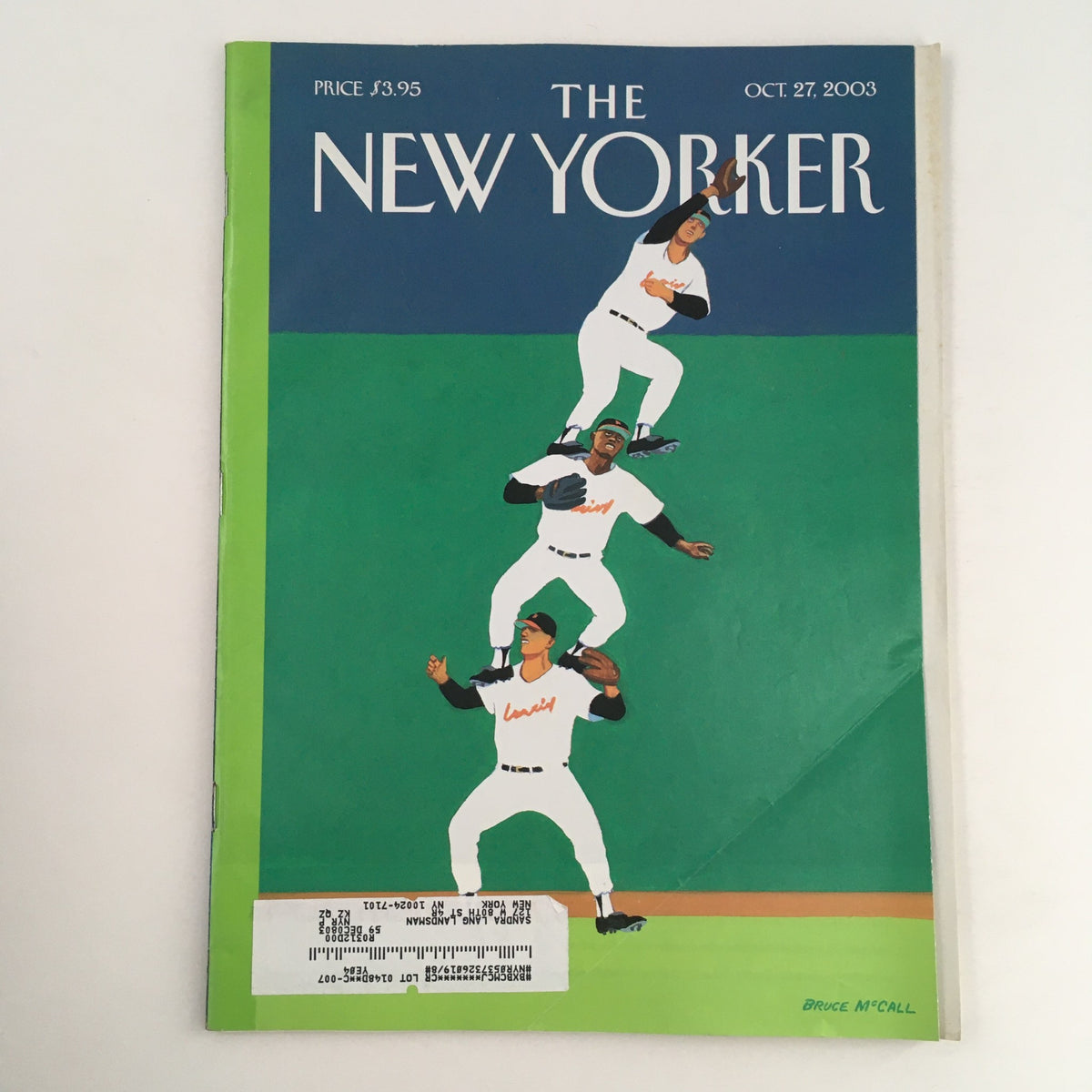 Cover of The New Yorker Full Magazine from October 27, 2003, featuring the illustration 'The Fly Ball' by Bruce McCall, showcasing three baseball players in action.
