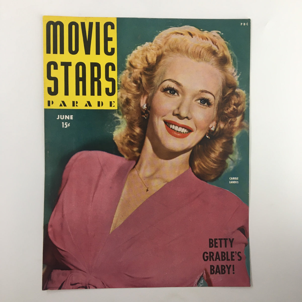 COVER ONLY Movie Stars Parade Magazine June 1944 showcasing Carole Landis smiling in a pink dress.