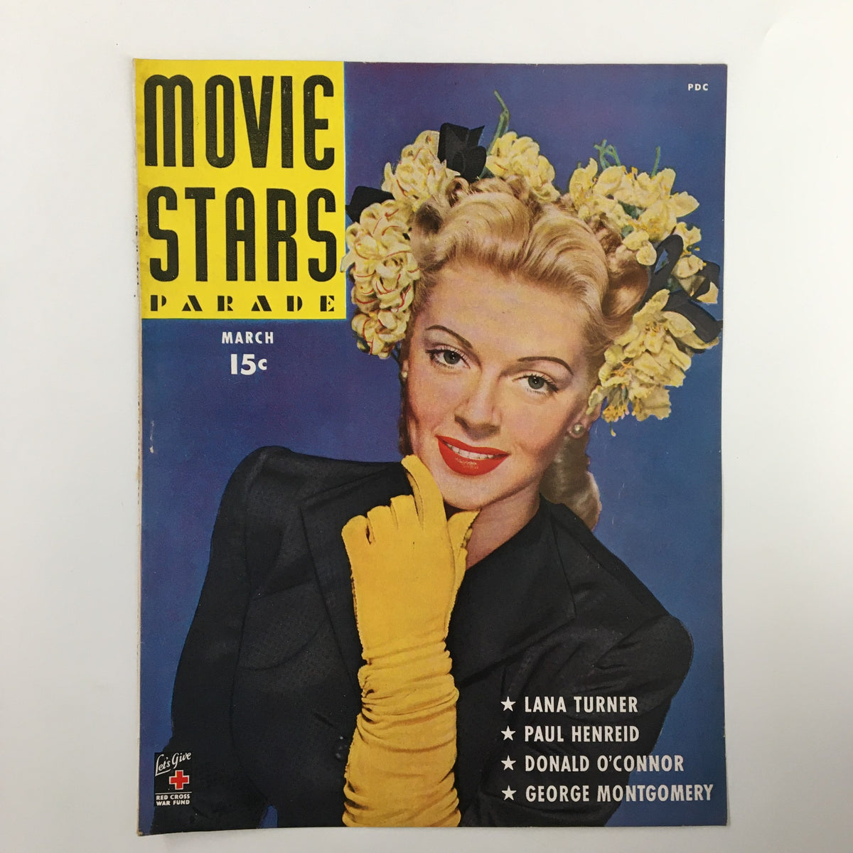 COVER ONLY Movie Stars Parade March 1944 featuring Lana Turner and Paul Henreid. Classic magazine cover design emphasizing vintage Hollywood aesthetics and iconic star power.