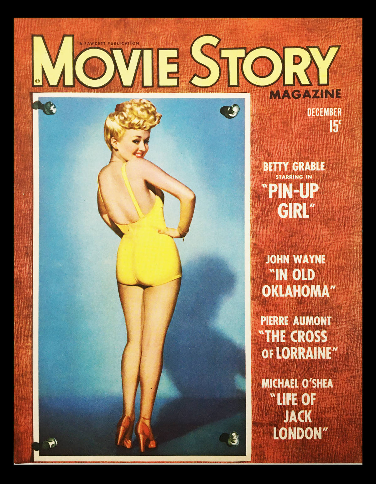 COVER ONLY Movie Story Magazine December 1943 featuring Betty Grable as Pin-Up Girl, showcasing her alluring pose in a yellow swimsuit against a blue background.