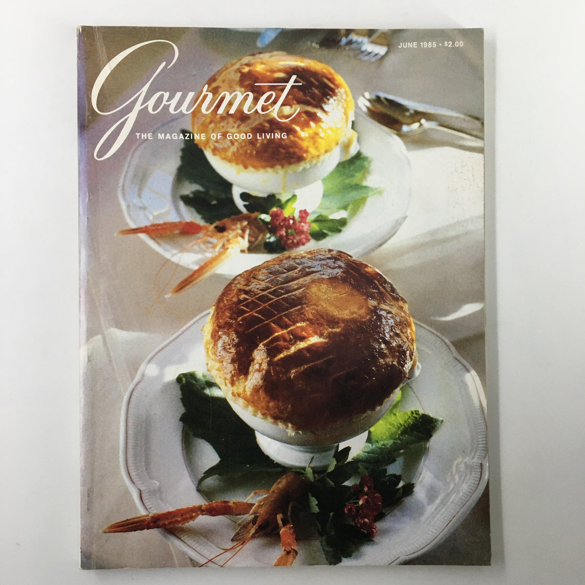 Cover of VTG Gourmet Magazine June 1985 featuring a gourmet dish with shrimp, showcasing the title 'Gourmet: The Magazine of Good Living' and highlighting culinary creativity.